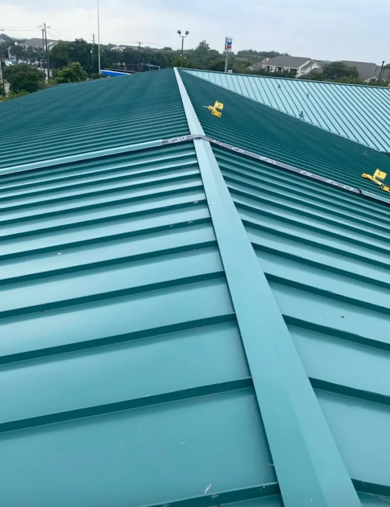 Green commercial metal roof ridge and valley for Metal Roof Repair in Centerville